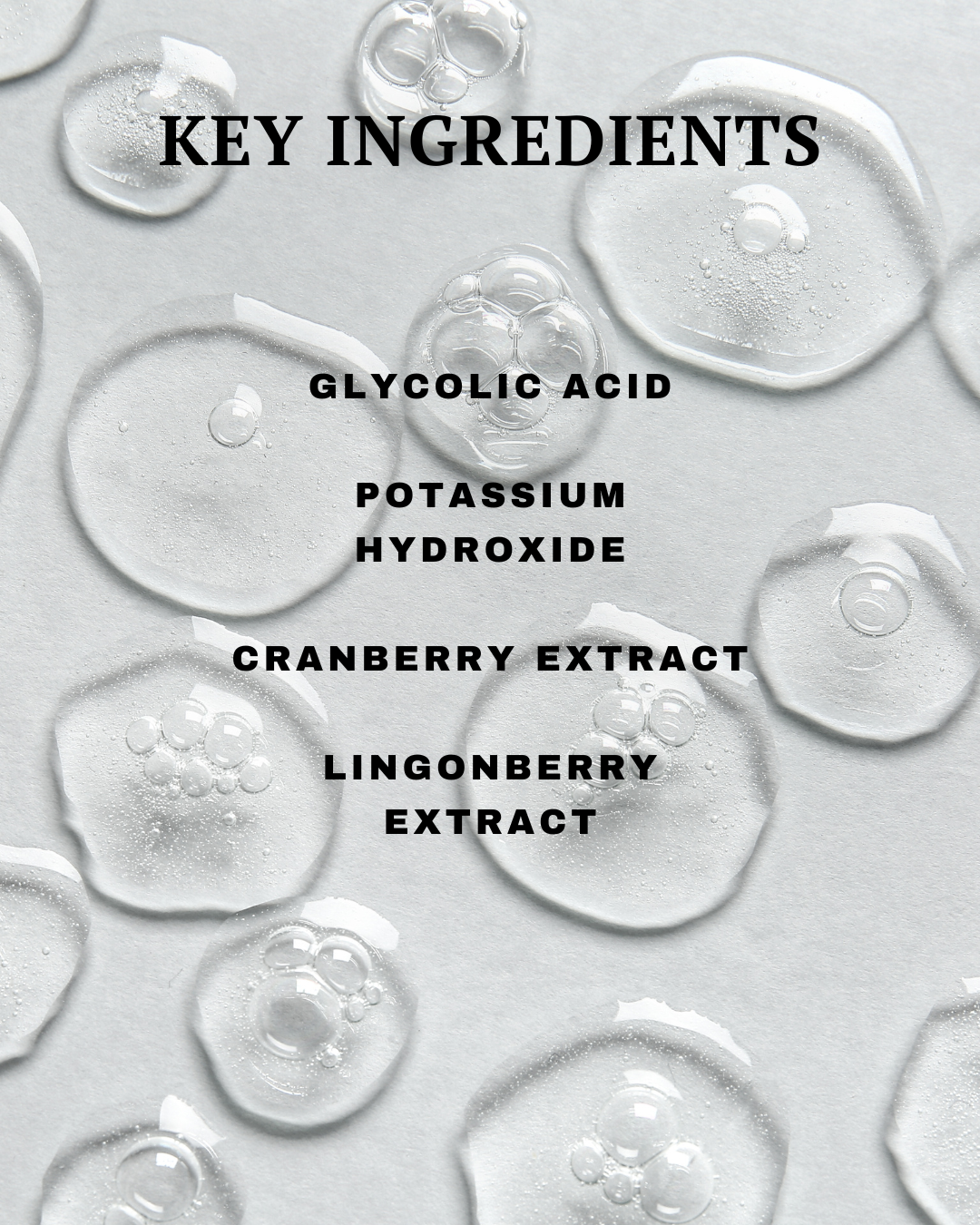 Key ingredients of a skincare product with glycolic acid, potassium hydroxide, cranberry extract, and lingonberry extract on a gray background.