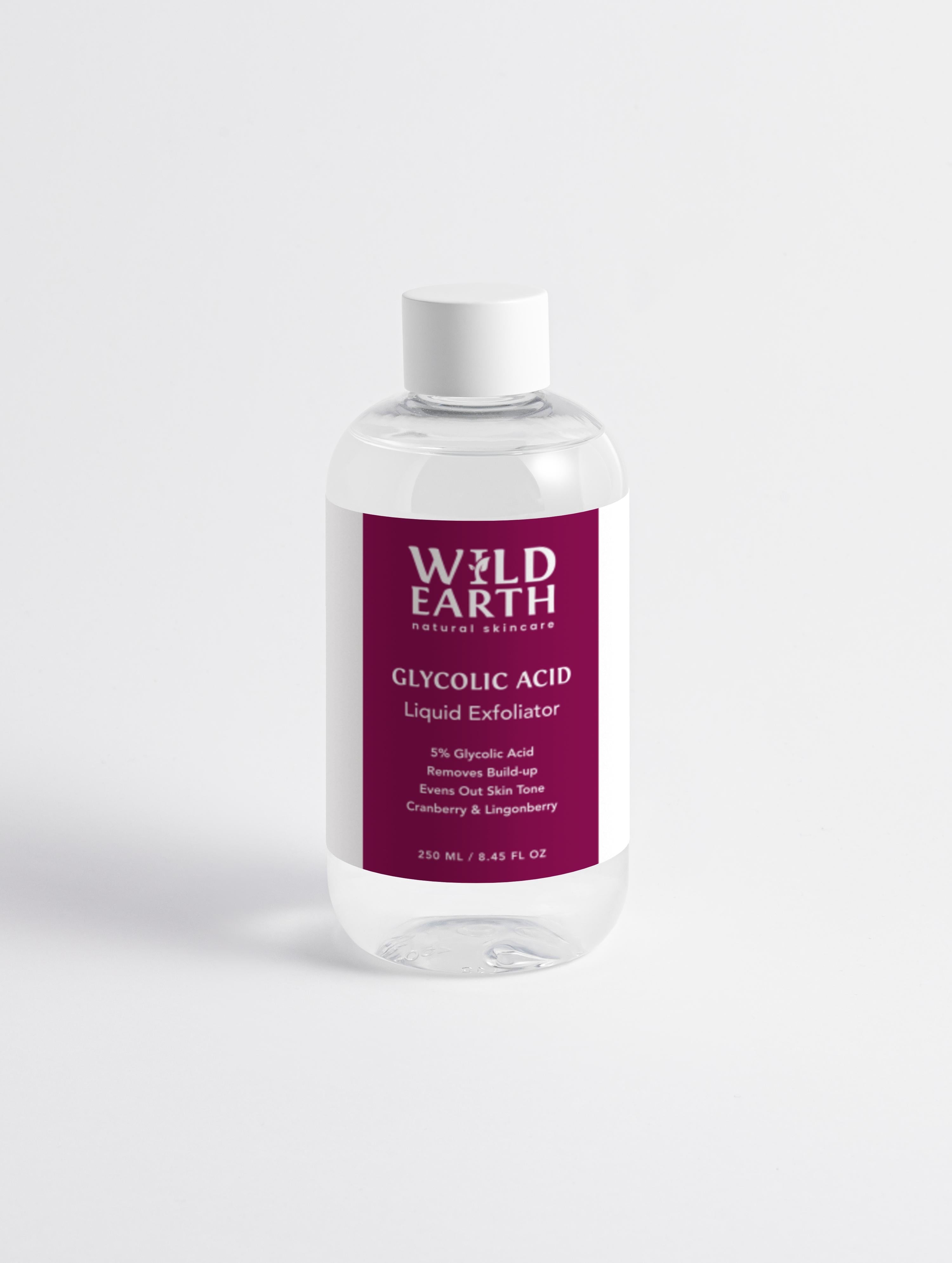 Bottle of Wild Earth Glycolic Acid Liquid Exfoliator on a white background