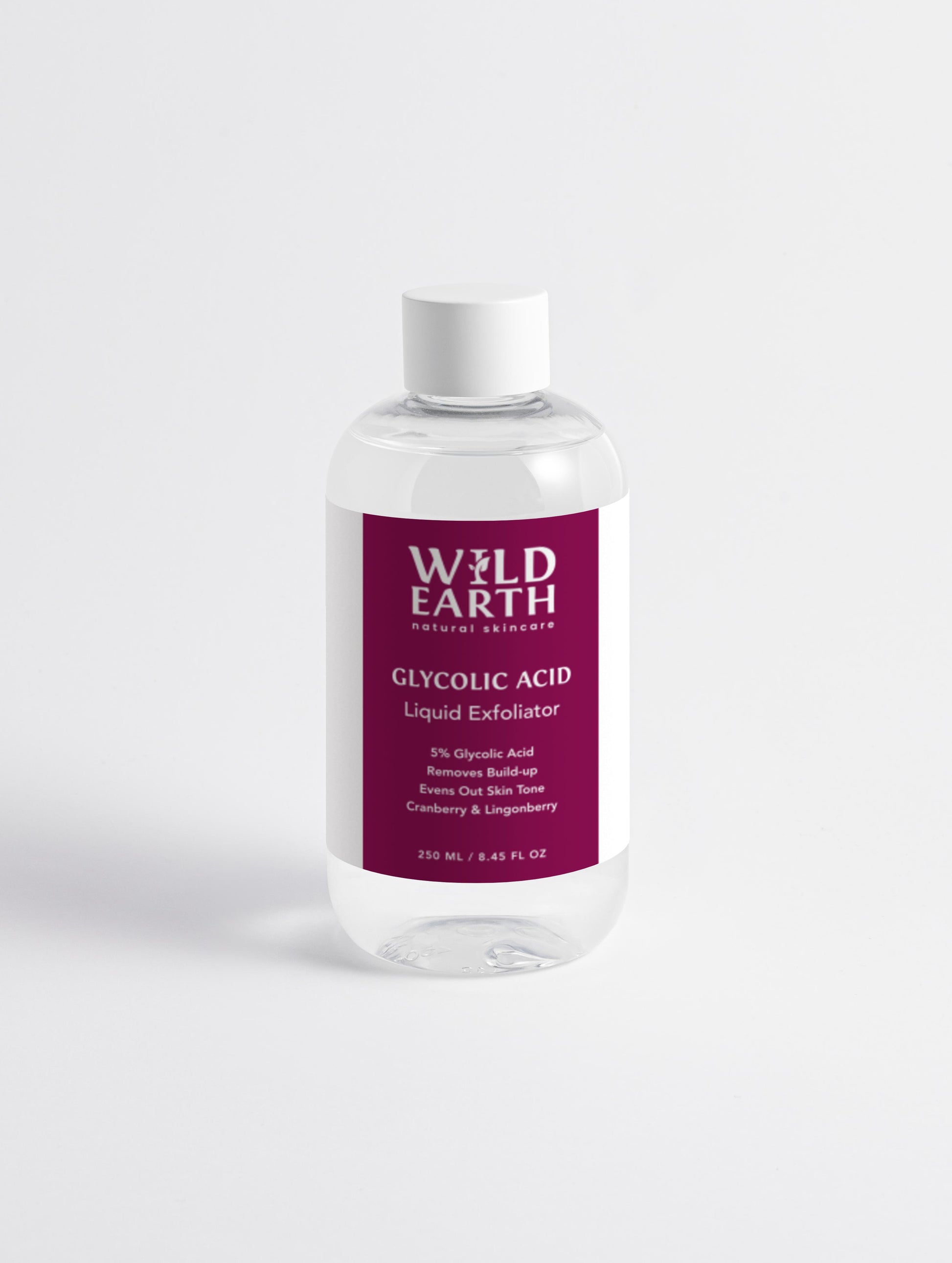 Bottle of Wild Earth Glycolic Acid Liquid Exfoliator on a white background